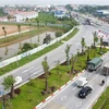 Tuyến đường trục Trung tâm khu đô thị mới Mê Linh, đoạn giáp ranh địa phận huyện Bình Xuyên (Vĩnh Phúc) và huyện Mê Linh (Hà Nội). (Ảnh minh họa: Hoàng Hùng/TTXVN)