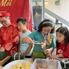 Lưu giữ truyền thống văn hóa dân tộc cho con cháu (Ảnh: Thanh Tú/TTXVN)