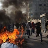 Người biểu tình Palestine xung đột với các lực lượng Israel tại thành phố Jenin, Bờ Tây ngày 26/1/2023. (Ảnh: THX/TTXVN)