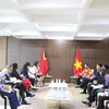 Bộ trưởng Ngoại giao Bùi Thanh Sơn gặp song phương Bộ trưởng Ngoại giao Timor Leste Albertina Magno. (Ảnh: Đào Trang/TTXVN)