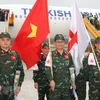 Cán bộ, chiến sỹ Quân đội Việt Nam vừa hoàn thành xuất sắc nhiệm vụ ở Thổ Nhĩ Kỳ về đến sân bay Nội Bài. (Ảnh: Trọng Đức/TTXVN)
