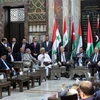 Chủ tịch Quốc hội Hammouda Sabbagh và các thành viên quốc hội Syria gặp phái đoàn từ Liên minh Nghị viện Arab tại Damascus (Syria), ngày 26/2/2023. (Nguồn: Reuters/Ảnh chụp màn hình)