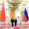 Chủ tịch Trung Quốc Tập Cận Bình (trái) và Tổng thống Nga Vladimir Putin tại Điện Kremlin ở Moskva tối 21/3/2023. Ảnh: AFP/TTXVN