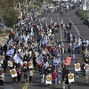 Người dân tham gia biểu tình phản đối kế hoạch cải cách tư pháp, tại Tel Aviv (Israel), ngày 20/2/2023. (Ảnh: AFP/TTXVN)