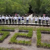 Các lãnh đạo Nhóm các nền kinh tế phát triển và mới nổi hàng đầu thế giới (G20) tại lễ trồng cây lưu niệm bên lề Hội nghị thượng đỉnh G20 ở Bali (Indonesia), ngày 16/11/2022. (Ảnh: AFP/TTXVN)