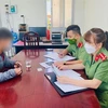 Một đối tượng phạm tội bị triệu tập tại cơ quan Công an tỉnh Quảng Ninh. (Ảnh: TTXVN phát)