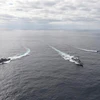 Tàu JS Atago của Lực lượng Phòng vệ Hàng hải Nhật Bản, tàu khu trục USS Barry của Mỹ và tàu khu trục lớp Sejong Đại đế của Hàn Quốc tham gia cuộc tập trận phòng thủ tên lửa ở vùng biển quốc tế phía Đông đảo Ulleung của Hàn Quốc, ngày 22/2/2023. (Ảnh: AFP/