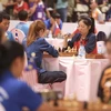 Các kỳ thủ thi đấu bộ môn cờ Ouk Chaktrang tại Phnom Penh (Campuchia) ngày 2/5/2023, trong khuôn khổ SEA Games 32. (Ảnh: Minh Quyết/TTXVN)