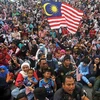 Người dân Malaysia háo hức đón Quốc khánh lần thứ 65, ngày 31/8/2022 Ảnh: TTXVN phát