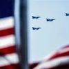 Các máy bay chiến đấu F-16 bay diễn tập trên bầu trời Washington, D.C. (Mỹ), ngày 30/3/2023. (Ảnh minh họa: AFP/TTXVN)