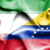 Quốc kỳ của Iran và Venezuela. Ảnh: IRNA/TTXVN