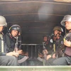 Cảnh sát Cơ động, Cảnh sát đặc nhiệm, Công an tỉnh Đắk Lắk, lực lượng đặc nhiệm Quân khu 5 phối hợp triển khai phương án vây bắt các đối tượng trong vụ tấn công tại Đắk Lắk. (Ảnh: Phan Anh Dũng/TTXVN)