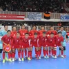 Đội tuyển Futsal Việt Nam chụp hình lưu niệm trước trận giao hữu gặp Đội tuyển Futsal Argentina trong khuôn khổ chuyến tập huấn tại Nam Mỹ. (Ảnh: Ngọc Tùng/TTXVN)