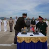 Tham dự buổi lễ có Ban Giám đốc Cơ quan Việt Nam tìm kiếm người mất tích (VNOSMP), Tổng Lãnh sự Hoa Kỳ tại Thành phố Hồ Chí Minh, lãnh đạo Văn phòng MIA Hoa Kỳ tại Hà Nội (DET2). (Ảnh: TTXVN phát)