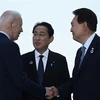 Lãnh đạo Mỹ-Nhật-Hàn trong cuộc gặp ba bên tại Hội nghị Thượng đỉnh Lãnh đạo Nhóm các nước công nghiệp phát triển hàng đầu thế giới ở Hiroshima (Nhật Bản), ngày 21/5/2023. (Ảnh: AFP/TTXVN)