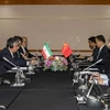 Chủ nhiệm Văn phòng Ủy ban Công tác Đối ngoại Trung ương Đảng Cộng sản Trung Quốc Vương Nghị (thứ hai, phải) và Thư ký Hội đồng An ninh Quốc gia Tối cao Iran Ali Akbar Ahmadian (trái) tại cuộc gặp ở Johannesburg (Nam Phi), ngày 24/7/2023. (Ảnh: THX/TTXVN)