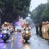 Lực lượng Cảnh sát Giao thông diễu hành tại Lễ Phát động Ra quân Năm An toàn Giao thông 2023, hồi tháng Hai năm nay. (Ảnh: Tuấn Anh/TTXVN)