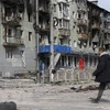 Tòa nhà bị hư hại do xung đột tại Mariupol (Ukraine), ngày 17/4/2022. (Ảnh: THX/TTXVN)