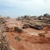 Cảnh tàn phá do mưa lũ gây ra bởi cơn bão Daniel ở thành phố Derna (Libya), ngày 11/9/2023. (Ảnh: AFP/TTXVN)