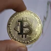 Đồng tiền kỹ thuật số bitcoin. Ảnh: AFP/ TTXVN