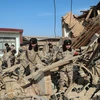 Binh sỹ làm nhiệm vụ tại hiện trường vụ động đất ở Tích Thạch Sơn, tỉnh Cam Túc (Trung Quốc), ngày 20/12/2023. (Ảnh: THX/TTXVN)
