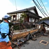 Những căn nhà bị phá hủy sau động đất mạnh ở Wajima, tỉnh Ishikawa, miền Trung Nhật Bản, ngày 2/1/2024. (Ảnh: AFP/TTXVN)