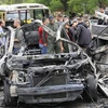 Hiện trường một vụ đánh bom xe tại Damascus (Syria). (Ảnh: AFP/TTXVN)