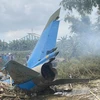 Hiện trường vụ máy bay huấn luyện quân sự rơi tại Điện Bàn (Quảng Nam), trưa 9/1/2024. (Ảnh: Trần Tĩnh/TTXVN)
