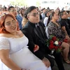 1.200 cặp đôitham gia một lễ cưới tập thể ở ngoại ô Thủ đô Mexico City (Mexico). (Nguồn: BNN Breaking)