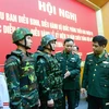 Thượng tướng Nguyễn Văn Nghĩa kiểm tra các mẫu trang phục, trang cụ phục vụ tại Lễ Kỷ niệm 70 năm Chiến thắng Điện Biên Phủ. (Nguồn: Quân đội nhân dân)