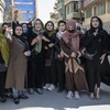 Phụ nữ Afghanistan biểu tình đòi các quyền lợi tại Thủ đô Kabul, ngày 8/3 năm ngoái. (Ảnh: AFP/TTXVN)