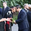 Lễ đón truyền thống Thủ tướng Phạm Minh Chính và Phu nhân thăm chính thức New Zealand. (Ảnh: Dương Giang/TTXVN)