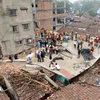 Lực lượng cứu hộ làm nhiệm vụ tại hiện trường vụ sập tòa nhà đang xây ở Kolkata, bang Tây Bengal (Ấn Độ), ngày 18/3/2024. (Ảnh: ANI/TTXVN)