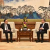 Phó Thủ tướng Trần Lưu Quang hội kiến Bộ trưởng Ngoại giao Trung Quốc Vương Nghị. (Ảnh: Thành Dương/TTXVN)