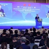 Chủ tịch Quốc hội Vương Đình Huệ phát biểu tại Diễn đàn Chính sách, Pháp luật Thúc đẩy Hợp tác Đầu tư và Thương mại Việt Nam-Trung Quốc. (Ảnh: Nhan Sáng/TTXVN)