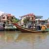 Tàu, thuyền của ngư dân Diễn Ngọc (huyện Diễn Châu, tỉnh Nghệ An) vừa cập bến. (Ảnh minh họa: Xuân Tiến/TTXVN)