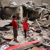 Một ngôi nhà bị phá hủy trong vụ oanh tạc của Israel xuống thành phố Rafah, miền Nam Dải Gaza ngày 27/4/2024. (Ảnh: AFP/TTXVN)