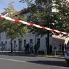 Cảnh sát gác tại một khu vực ở Berlin (Đức) sau vụ tấn công. (Ảnh: AFP/TTXVN)
