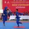 Vận động viên Việt Nam với phần thi biểu diễn song luyện kiếm nam. (Ảnh: Trần Lê Lâm/TTXVN)
