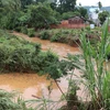 Nhiều năm qua, cứ đến mùa mưa người dân sinh sống hai bên dòng suối Đắk Woa lại nơm nớp nỗi lo ngập lụt bất ngờ. (Ảnh: Nhật Bình/TTXVN)
