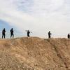 Các lực lượng Iraq tham gia chiến dịch truy quét IS tại al-Miqdadiyah, tỉnh Diyala (Iraq), ngày 10/3/2024. (Ảnh: AFP/TTXVN)