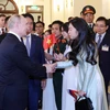 Tổng thống Liên bang Nga Vladimir Putin đến dự buổi gặp gỡ lãnh đạo Hội Hữu nghị Việt-Nga và các thế hệ cựu sinh viên Việt Nam học tại Nga. (Ảnh: Nhan Sáng/TTXVN)