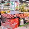 Người dân mua sắm tại siêu thị WinMart Võ Thị Sáu, quận Hai Bà Trưng (Hà Nội). (Ảnh: Trần Việt/TTXVN)