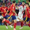 "Cơn địa chấn" mang tên Gruzia đã phải dừng bước trước ứng viên nặng ký cho chức vô địch EURO 2024 là Tây Ban Nha khi để thua 1-4 trong trận đấu vòng 1/8 ở Cologne (Đức) ngày 30/6/2024. (Ảnh: TTXVN phát)