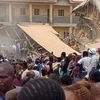 Hiện trường vụ sập tòa nhà hai tầng nằm trong khuôn viên Học viện Saint tại bang Plateau, miền Trung Nigeria ngày 12/7/2024. (Ảnh: Intel Region/TTXVN)