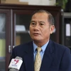 Tổng Giám đốc Thông tấn xã Lào Khampheui Philapha trả lời phỏng vấn phóng viên Thông tấn xã Việt Nam tại Lào. (Ảnh: Xuân Tú/TTXVN)