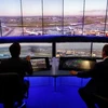 Theo công ty phân tích dữ liệu hàng không Cirium, hàng trăm chuyến bay đến và đi từ Anh đã bị hủy do sự cố máy tính toàn cầu. (Ảnh: AFP/TTXVN)