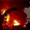 Khói lửa bốc lên ngùn ngụt sau vụ tấn công của Israel tại Hodeidah (Yemen), ngày 20/7/2024. (Ảnh: Getty Images/ TTXVN)
