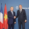 Cựu Thủ tướng Pháp Edouard Philippe, Thị trưởng Thành phố Le Havre đón Tổng Bí thư, Chủ tịch nước Tô Lâm. (Ảnh: Trí Dũng/TTXVN)