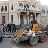 Hiện trường vụ nổ bom ở trụ sở công ty đường sắt Hijaz, Damascus. (Nguồn: AFP)